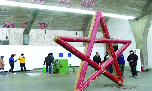 Artist Ren Zhitian's Pentagram exhibited Friday at 798 Art Zone. Government art event Asia Art Expo rejected his work for fear the red star might topple over. Photo: Huang Shaojie/GT 