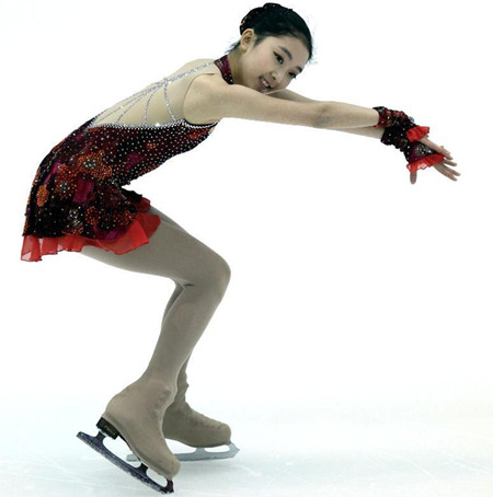 Li Zijun, 15, performs during the China Winter Games last week. Li claimed all three women's singles gold medals and is aiming to contend for a medal at the 2014 Sochi Olympics. 