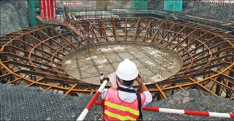 The Sanmen Nuclear Power Project under construction in Zhejiang province. China approved six new projects last year before the Japanese nuclear crisis in March 2011. [Photo/China Daily]