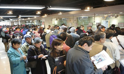 Local residents queue for discounted tickets at the Shanghai Grand Theater. Photo: Courtesy of the theater