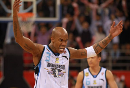 Stephon Marbury of the Beijing Ducks celebrates after the Game 4 of the CBA Finals against the Guangdong Southern Tigers at the MasterCard Center in Beijing, March 28, 2012.