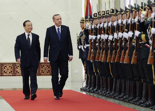 Turkish Prime Minister Recep Tayyip Erdogan (2nd L) attends the welcoming ceremony held by Chinese Premier Wen Jiabao (1st L) in Beijing, capital of China, April 9, 2012. (Xinhua/Zhang Duo)