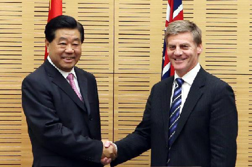 Jia Qinglin (L), chairman of the National Committee of the Chinese People's Political Consultative Conference (CPPCC), meets with New Zealand's acting Prime Minister Bill English during Jia's visit in Wellington, New Zealand, April 16, 2012. [Photo: Xinhua/Yao Dawei]