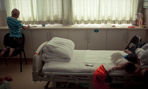 Zhu Zhengyin, 10, a victim of domestic violence, in a Beijing hospital Monday [Photo: Li Hao/GT]