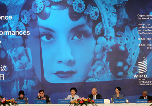 Liu Binjie (from left), head of the General Administration of Press and Publications, State Councilor Liu Yandong, Director-General of the World Intellectual Property Organization Francis Gurry and other officials attend the opening ceremony of the Diplomatic Conference on the Protection of Audiovisual Performances in Beijing on Wednesday. [Feng Yongbin/China Daily]