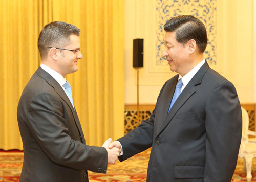 Chinese Vice President Xi Jinping (R) meets with visiting President-Elect of the 67th session of the UN General Assembly Vuk Jeremic, who is also Serbia's foreign minister, in Beijing, capital of China, July 17, 2012. (Xinhua/Yao Dawei)