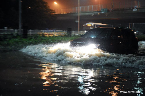 lashed Beijing Saturday have left at least four people dead and six others injured. (Xinhua/Li Xin) 