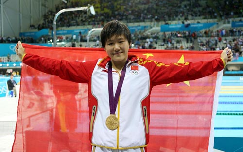 Gold medalist Ye Shiwen of China poses after the awarding ceremony of womens 200m individual medley swimming event at London 2012 Olympic Games in London, Britain, on July 31, 2012. [Xinhua]