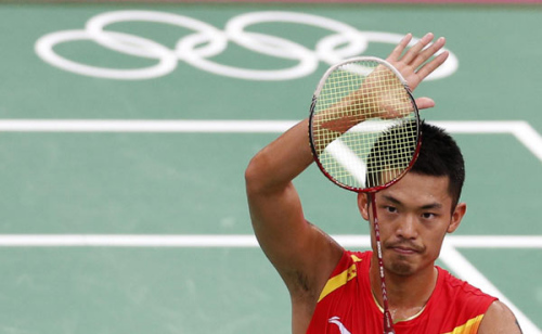 China's Lin Dan celebrates after winning against Indonesia's Taufik Hidayat during their men's singles round of 16 badminton match during the London 2012 Olympic Games at the Wembley Arena, Aug 1, 2012.