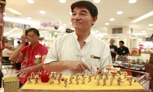 Maohou master Sun Huaizhong has been on a mission to revive the ailing Beijing folk art since 2003 by hosting lectures and workshops. Photo: Li Hao/GT 