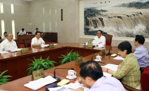 Wu Bangguo, chairman of the Standing Committee of the National People's Congress (NPC), presides over a meeting of the Chairmen's Council of the 11th NPC Standing Committee at the Great Hall of the People in Beijing, capital of China, Aug. 20, 2012. (Xinh