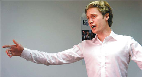 Canadian tenor Lucas van Lierop works hard on his performance of the classic The White-Haired Girl. Photos provided to China Daily