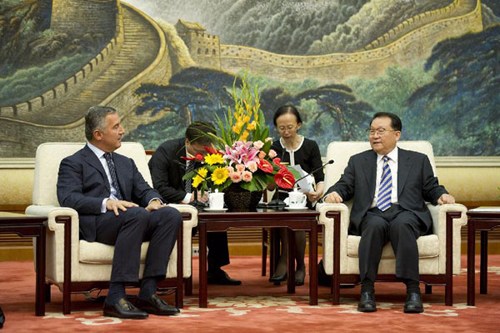 Li Changchun (R) meets with a delegation from Montenegro's ruling Democratic Party of Socialists (DPS) headed by DPS President Milo Djukanovic (L) in Beijing, capital of China, Sept. 3, 2012. (Xinhua/Huang Jingwen)