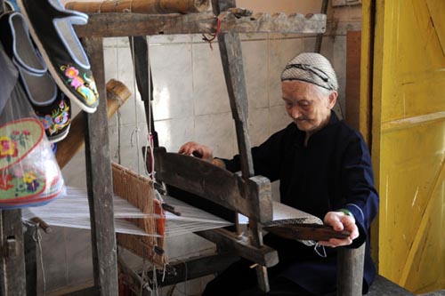 Huang Magan, 107, is one of 87 centenarians in Bama Yao autonomous county in the Guangxi Zhuang autonomous region, most of whom are able to care for themselves. Liang Shaoen / Xinhua