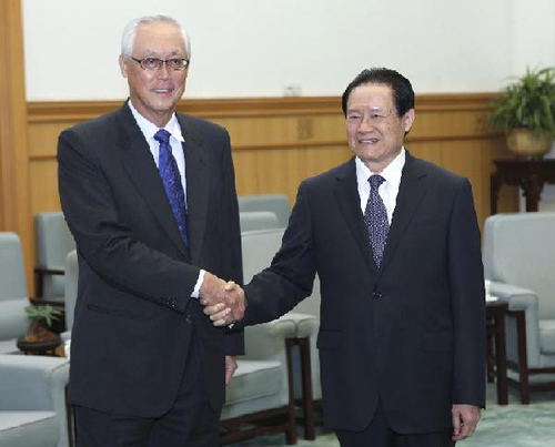 Zhou Yongkang (R), a member of the Standing Committee of the Political Bureau of the Communist Party of China (CPC) Central Committee and secretary of the Committee of Political and Legislative Affairs of the CPC Central Committee, meets with Singaporean Emeritus Senior Minister Goh Chok Tong in Beijing, China, Sept. 10, 2012. (Xinhua/Pang Xinglei)