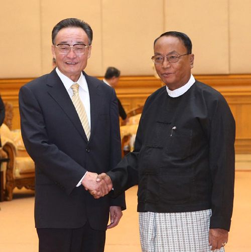 Wu Bangguo (L), chairman of the Standing Committee of China's National People's Congress (NPC), meets with Representative to the House of Nationalities of the Parliament of Myanmar U Khin Aung Myint in Nay Pyi Taw, Myanmar, Sept. 13, 2012. (Xinhua/Liu Weibing) 