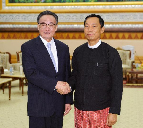 Wu Bangguo (L), chairman of the Standing Committee of China's National People's Congress, meets with Thura U Shwe Mann, Speaker of the House of Representatives of Myanmar, in Nay Pyi Taw, Myanmar, Sept. 13, 2012. (Xinhua/Li Tao)