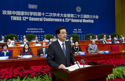 Chinese President Hu Jintao (front) addresses the opening ceremony of the 12th General Conference and the 23rd General Meeting of the Academy of Science for the Developing World (TWAS) in Tianjin, north China, Sept. 18, 2012. (Xinhua/Huang Jingwen) 