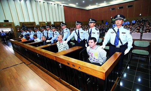 Six suspects, including Naw Kham (far right), stand trial on Thursday in a court in Kunming, Southwest China's Yunnan Province. Photo: Xinhua 