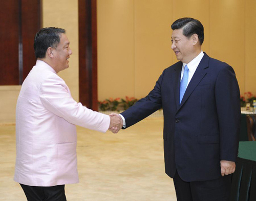 Chinese Vice President Xi Jinping (R) meets with Thai Deputy Prime Minister Kittiratt Na-Ranong as they attend the 9th China-ASEAN (Association of Southeast Asian Nations) Expo in Nanning, capital of south China's Guangxi Zhuang Autonomous Region, Sept. 2