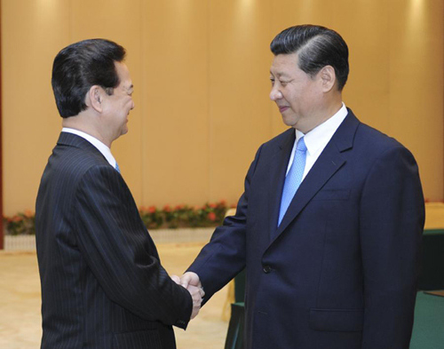 Chinese Vice President Xi Jinping (R) meets with Vietnamese Prime Minister Nguyen Tan Dung as they attend the 9th China-ASEAN (Association of Southeast Asian Nations) Expo in Nanning, capital of south China's Guangxi Zhuang Autonomous Region, Sept. 20, 20