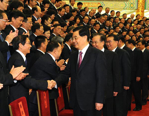 Chinese top leaders Hu Jintao, Wen Jiabao, Li Changchun, Xi Jinping and Li Keqiang meet with representatives attending an award ceremony on the work of reforms and development in the country's cultural sector, in Beijing, capital of China, Sept. 26, 2012.