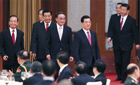 Chinese leaders attend a reception marking the 63rd anniversary of the founding of the People's Republic of China, at the Great Hall of the People in Beijing on Saturday. China's National Day falls on October 1. Xu Jingxing / China Daily