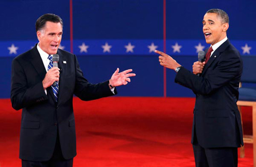 US Republican presidential nominee Mitt Romney and US President Barack Obama during the second presidential debate in New York.[Mike Segar / REUTERS]