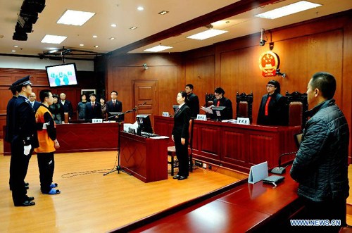 Li Mengnan, a teenager who killed a doctor and injured three others at a hospital, is on trial at the Intermediate People's Court of Harbin, in Harbin, capital of northeast China's Heilongjiang Province, Oct. 19, 2012. Li, 18, received a life sentence and was also ordered to pay more than 680,000 yuan (108,743 U.S. dollars) to the victims' families in compensation. On March 23, 2012, Li, an out-patient with the First Affiliated Hospital of Harbin Medical University, attacked four medical workers with a knife after misunderstandings toward the treatment program prescribed by doctors, the ruling said. Wang Hao, a 28-year-old intern of the hospital, was stabbed to death, and three others suffered injuries. (Xinhua/Wang Jianwei)