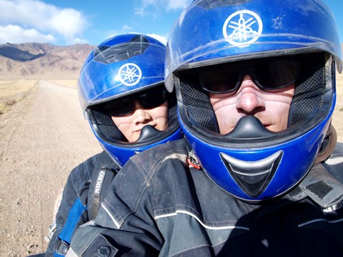 After a motorbike trip to Tibet tested their love, the newly married couple took a 26,000-kilometer journey across 15 countries from Shanghai to Hamburg, Germany. Provided to China Daily