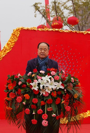 Nobel Literature Laureate Mo Yan speaks at the Red Sorghum Cultural Festival in Gaomi city, Shandong province, on Oct 29, 2012. The third Red Sorghum Cultural Festival became a much bigger event this year after Mo Yan won the Nobel Prize. Mo, author of the novel Red Sorghum, said he hopes other Chinese writers and artists can receive more attention now. [Photo/Asianewsphoto]