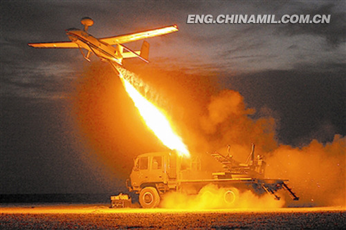 The picture shows an artillery troop unit under the Guangzhou Military Area Command (MAC) uses new home-made unmanned plane to support long-distance precision strikes in early September, in a bid to improve the combat capability of artillery force. (Photo by Wu Sulin)