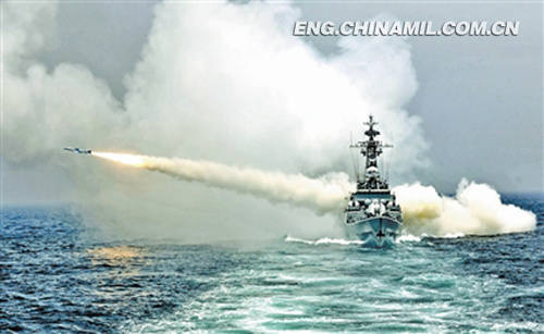 The picture shows a ship formation of a maritime garrison command under the East China Sea Fleet of the PLA Navy is conducting drill of maneuvering at the sea and actual missile-firing on September 24, 2012, in order to temper troops combat capability in complex electromagnetic environment. (Photo by Jiang Shan)