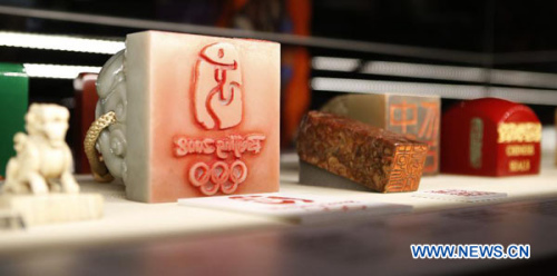 Photo taken on Nov. 1, 2012 shows seals carved by Former Chinese Vice Premier Li Lanqing at the British Museum in London, capital of Britain. The exhibition of Contemporary Chinese Seals by Li Lanqing was opened at the museum on Thursday and will last til