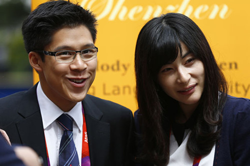 Guo Jingjing (right) and Kenneth Fok Kai-kong will be married on Thursday. PROVIDED TO CHINA DAILY