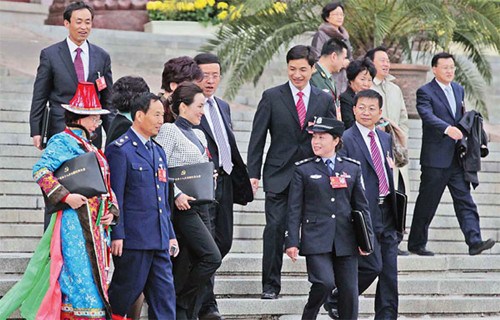 Delegates leave the Great Hall of the People after the preparatory meeting of the 18th Party Congress in Beijing on Wednesday. There have been increasing numbers of women attending Party congresses over the past 10 years. Xu Jingxing / China Daily