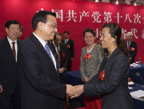 Li Keqiang (L, front) joins a panel discussion of Shandong delegation to the 18th National Congress of the Communist Party of China (CPC) in Beijing, capital of China, Nov. 8, 2012. The 18th CPC National Congress was opened in Beijing on Thursday. (Xinhua/Li Xueren)