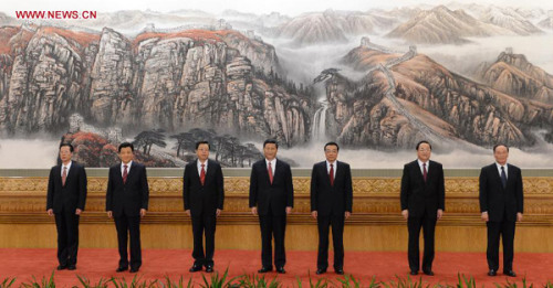 General Secretary of the Central Committee of the Communist Party of China (CPC) Xi Jinping (C) and the other newly-elected members of the Standing Committee of the 18th CPC Central Committee Political Bureau Li Keqiang (3rd R), Zhang Dejiang (3rd L), Yu Zhengsheng (2nd R), Liu Yunshan (2nd L), Wang Qishan (1st R), Zhang Gaoli (1st L) meet with journalists at the Great Hall of the People in Beijing, capital of China, Nov. 15, 2012. (Xinhua/Xie Huanchi)