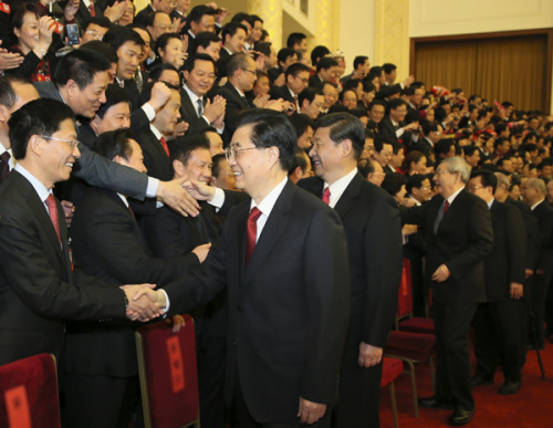 Chinese President Hu Jintao and newly-elected General Secretary of the Communist Party of China (CPC) Central Committee and Chairman of the CPC Central Military Commission Xi Jinping meet with delegates, special delegates and observers to the recently concluded 18th CPC National Congress, in Beijing, capital of China, Nov. 15, 2012. (Xinhua/Ju Peng)