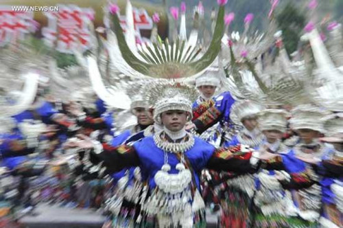 People of Miao ethnic group perform during the celebration of Miao's New Year in Leishan County, southwest China's Guizhou Province, Nov. 25, 2012. (Xinhua/Ou Dongqu) 