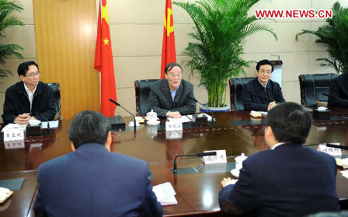 Wang Qishan (C), a Standing Committee member of the Political Bureau of the Communist Party of China (CPC) Central Committee and secretary of the CPC Central Commission for Discipline Inspection (CCDI), speaks at a seminar held to solicit suggestions from the legal academic circle on enhancing supervision of cadres to prevent corruption and improving the party's working style in Beijing, capital of China, Nov. 30, 2012. (Xinhua/Li Tao)