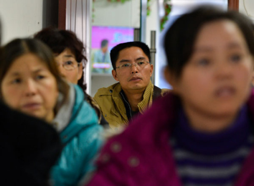 Li Dabin attends training to become a maternity matron in Changsha, Hunan province on Dec 1. Li, a former college teacher with a master's degree, gave up his former job and decided to become a maternity matron. He attends training in Changsha, Hunan province and has set up his own domestic service company in Kunming, Yunnan province. A maternity matron encompasses the role of nanny, nurse, cook and pre-school teacher and thus the salary can be more than 6,000 yuan ($963) in big cities such as Beijing and Shanghai. During peaks in birthrates, the demand for the service usually exceeds supply. [Photo/Xinhua]