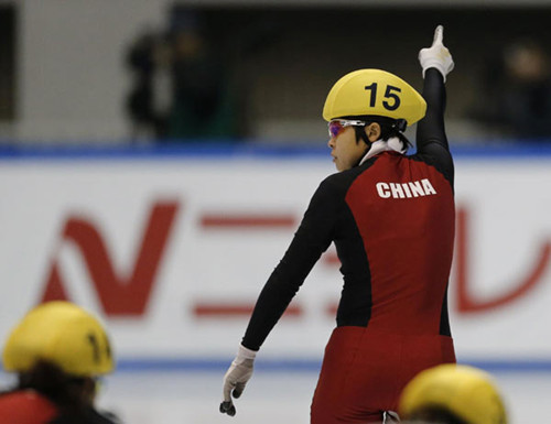 China's Wang Meng reacts after winning in the women's 500 meter final during the ISU Short Track World Cup competition in Nagoya, central Japan, Dec 2, 2012. [Photo/Agencies]