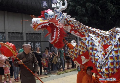 Actors perform at the opening of the new Chinatown in San Jose, capital of Costa Rica, on Dec. 5, 2012. (Xinhua/Kent Gilbert) 