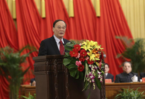 Wang Qishan, a Standing Committee member of the Political Bureau of the Communist Party of China (CPC) Central Committee and secretary of the CPC Central Commission for Discipline Inspection (CCDI), on behalf of the CPC Central Committee, delivers a congratulatory address to the opening of the ninth national congress of the Taiwan Democratic Self-Government League (TDSGL) in Beijing, capital of China, Dec. 11, 2012. The TDSGL held its ninth national congress on Tuesday. (Xinhua/Pang Xinglei)