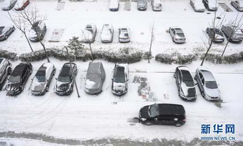 In Beijing, snow and fog have caused delays in bus lines and flights.