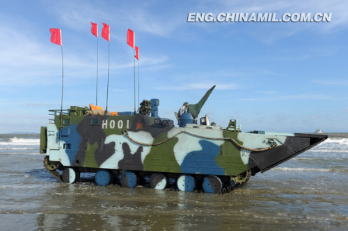 A brigade of the Marine Corps under the Navy of the Chinese Peoples Liberation Army (PLA), which was praised as land tiger, sea dragon and air eagle, carried out a series of amphibious armored training at the end of the year 2012 so as to solve the bottleneck problems in assessment. The photo shows the splendid moment of training. (China Military Online/Li Tang)