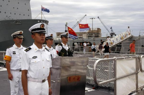 Soliders stand in front of visiting Chinese navy ships in Sydney, Australia, on Dec. 20, 2012. Three Chinese navy ships returning home from counter-piracy operations in the Gulf of Aden arrived in Sydney on Tuesday and began a five-day visit to Australia.