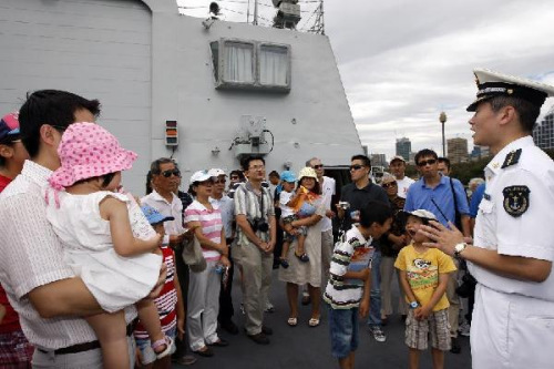 People visit Frigate Changzhou, one of the three visiting Chinese navy ships in Sydney, Australia, on Dec. 20, 2012. Three Chinese navy ships returning home from counter-piracy operations in the Gulf of Aden arrived in Sydney on Tuesday and began a five-day visit to Australia. (Xinhua/Jin Linpeng)