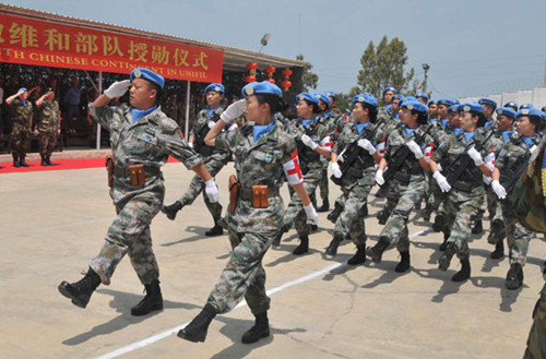 China's peacekeeping medical team on parade at its base in southern Lebanon in May. LIU SHUN / XINHUA